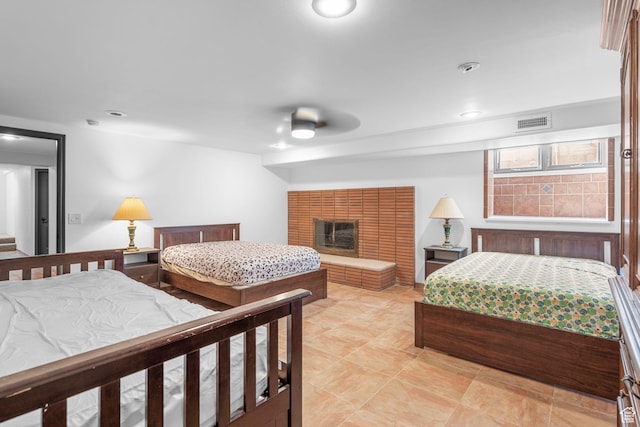 143 E 200 S, St George, UT 84770 - bedroom with recessed lighting and a fireplace