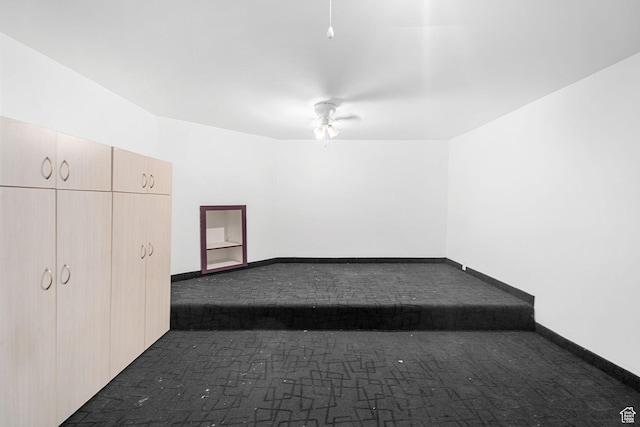 143 E 200 S, St George, UT 84770 - spare room featuring dark colored carpet and a ceiling fan