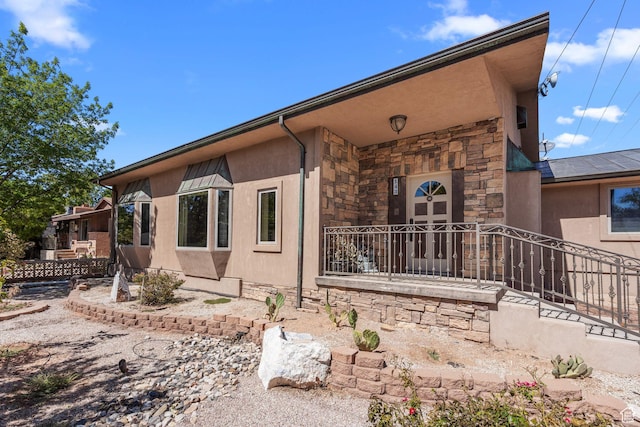 143 E 200 S, St George, UT 84770 - view of front of home featuring stone siding and stucco siding