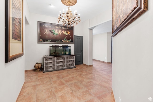 143 E 200 S, St George, UT 84770 - living room featuring a chandelier and baseboards