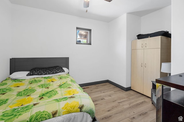 143 E 200 S, St George, UT 84770 - bedroom with light wood-style floors, a closet, and a ceiling fan