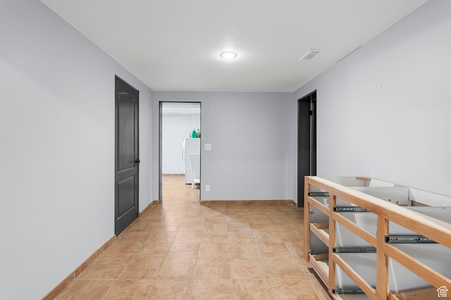 143 E 200 S, St George, UT 84770 - empty room featuring washer / dryer and baseboards