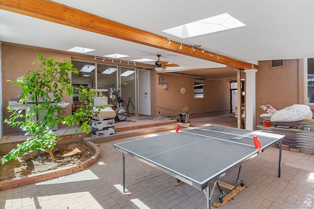 143 E 200 S, St George, UT 84770 - game room featuring a skylight, brick patterned floors, and a ceiling fan