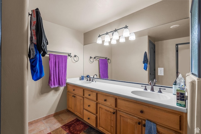 143 E 200 S, St George, UT 84770 - bathroom featuring double vanity and tile patterned flooring