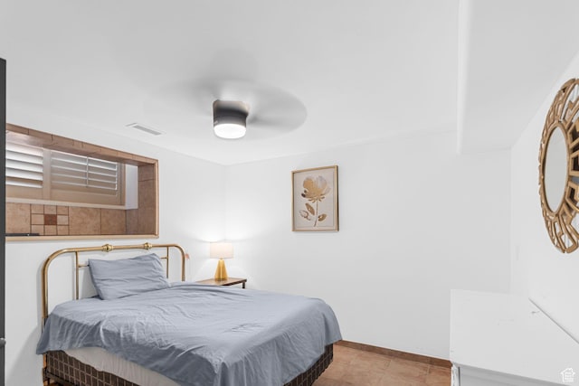 143 E 200 S, St George, UT 84770 - bedroom with ceiling fan and baseboards