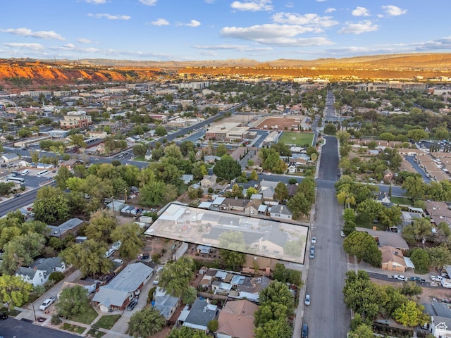143 E 200 S, St George, UT 84770 - aerial perspective of suburban area featuring a mountain backdrop