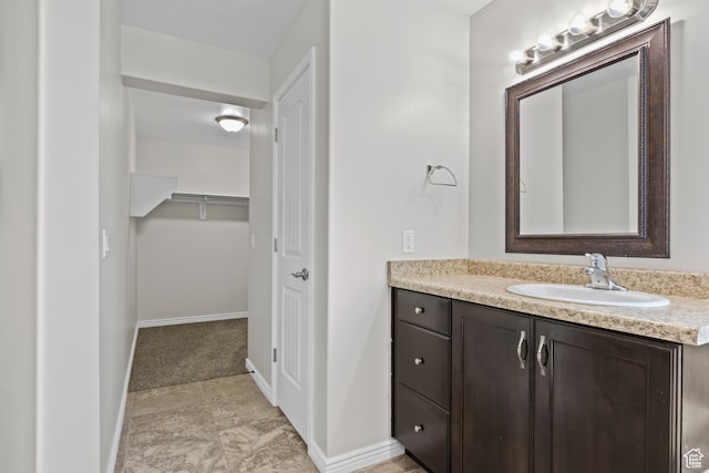 3342 S 240 W, Washington, UT 84780 - bathroom featuring vanity and a walk in closet