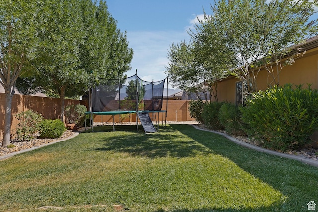 3342 S 240 W, Washington, UT 84780 - fenced backyard with a trampoline