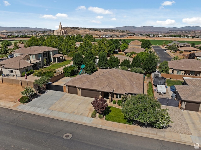 3342 S 240 W, Washington, UT 84780 - aerial view of residential area featuring a mountainous background
