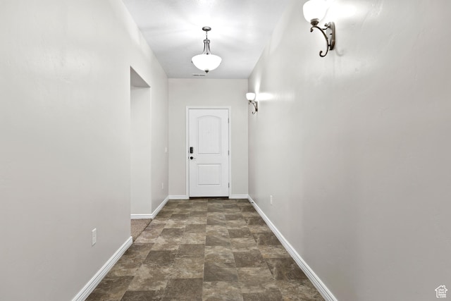 3342 S 240 W, Washington, UT 84780 - doorway featuring stone finish floors and baseboards
