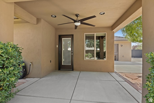 3342 S 240 W, Washington, UT 84780 - entrance to property with a ceiling fan, stucco siding, and a patio