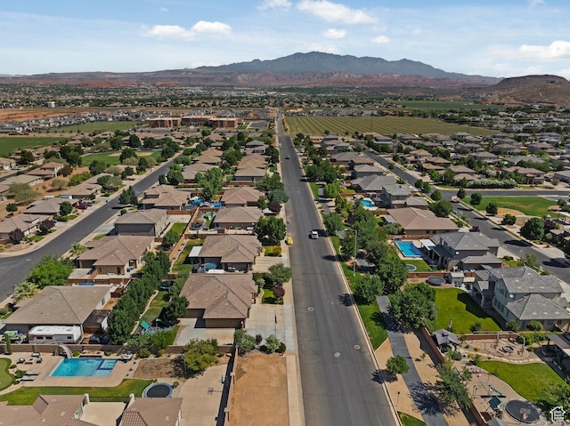3342 S 240 W, Washington, UT 84780 - aerial overview of property's location with a mountainous background and nearby suburban area