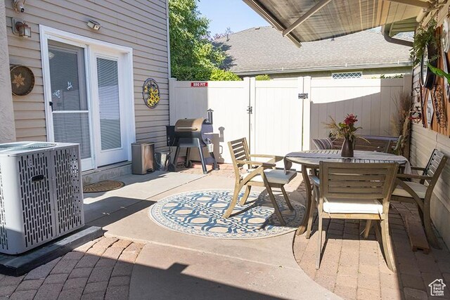 435 W Cobblestone Dr, Providence, UT 84332 - view of patio featuring outdoor dining space and area for grilling