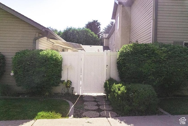 435 W Cobblestone Dr, Providence, UT 84332 - view of yard featuring an attached garage