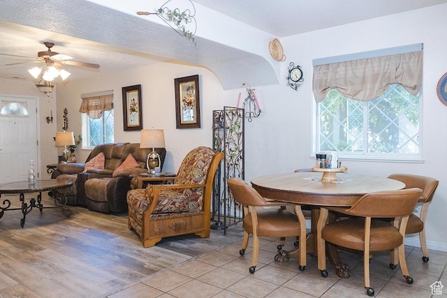 435 W Cobblestone Dr, Providence, UT 84332 - dining space featuring ceiling fan and light tile patterned flooring