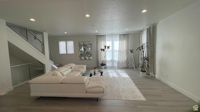 4678 W Vermillion Dr S, South Jordan, UT 84009 - living area with recessed lighting, stairway, and light wood finished floors