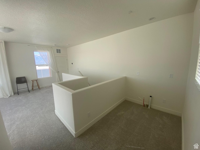 4678 W Vermillion Dr S, South Jordan, UT 84009 - carpeted empty room with a textured ceiling and baseboards
