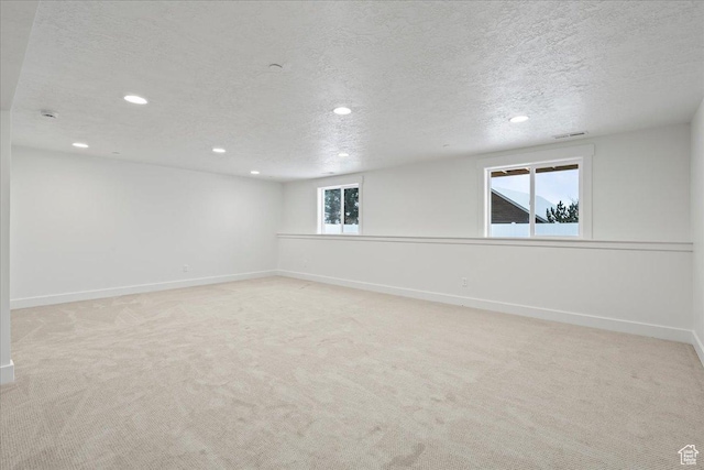 2230 S 635 W Unit C, Perry, UT 84302 - carpeted empty room featuring a textured ceiling and recessed lighting