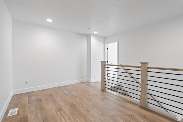2230 S 635 W Unit C, Perry, UT 84302 - spare room featuring light wood finished floors, recessed lighting, and a textured ceiling