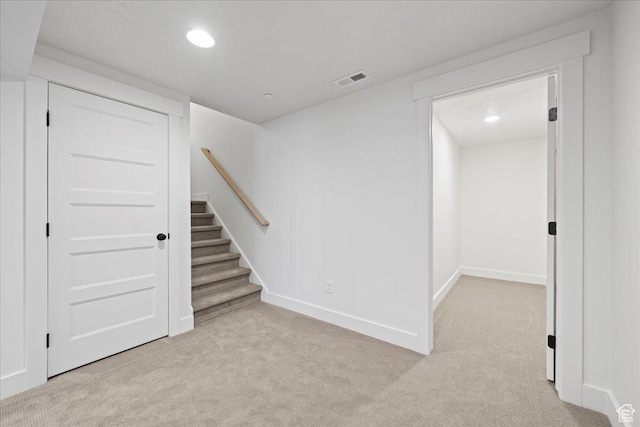 2230 S 635 W Unit C, Perry, UT 84302 - empty room featuring light carpet, recessed lighting, and stairs