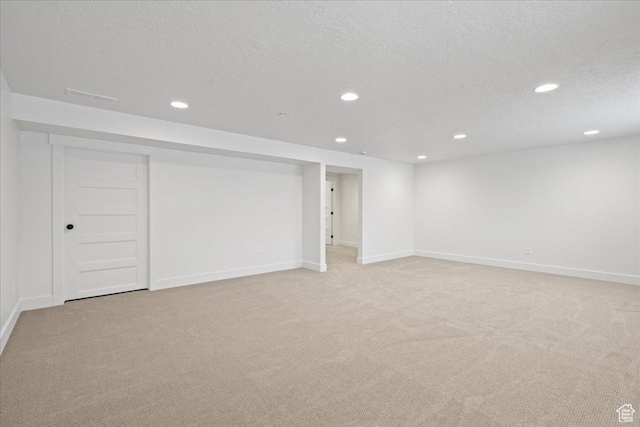 2230 S 635 W Unit C, Perry, UT 84302 - finished basement featuring light colored carpet, recessed lighting, and a textured ceiling