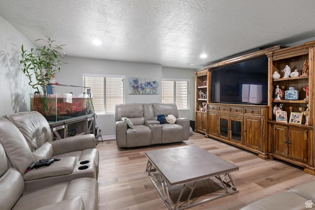 6447 W Arranmore Dr, South Jordan, UT 84009 - living area featuring a textured ceiling, light wood-type flooring, and recessed lighting