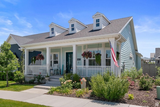 6447 W Arranmore Dr, South Jordan, UT 84009 - view of front of house with covered porch and a shingled roof
