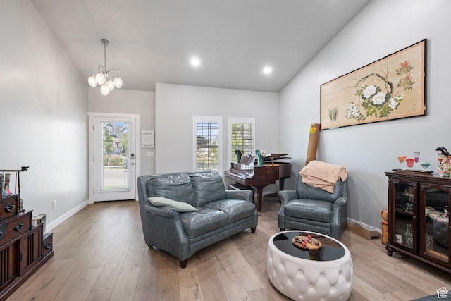 6447 W Arranmore Dr, South Jordan, UT 84009 - living room featuring vaulted ceiling, light wood-style flooring, a chandelier, and recessed lighting