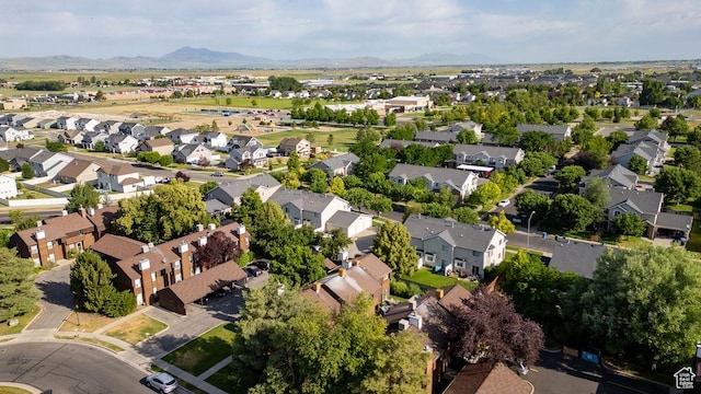 357 W 1100 N Unit 7, Logan, UT 84341 - aerial view of property and surrounding area featuring nearby suburban area and a mountain backdrop