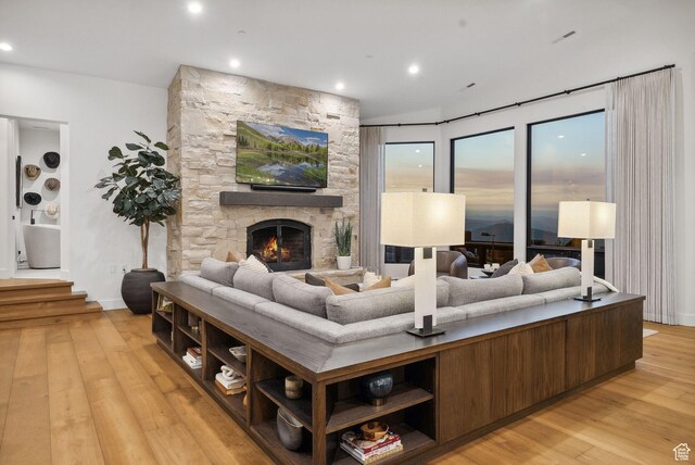 1427 Eagle Way, Park City, UT 84060 - living room with light wood-style floors, a stone fireplace, and recessed lighting