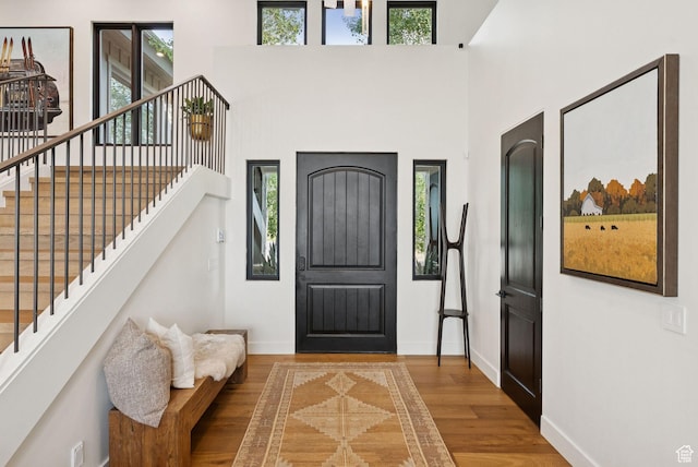 1427 Eagle Way, Park City, UT 84060 - foyer with wood finished floors, stairway, and a high ceiling