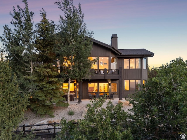 1427 Eagle Way, Park City, UT 84060 - rear view of property with a chimney, a patio, and a deck