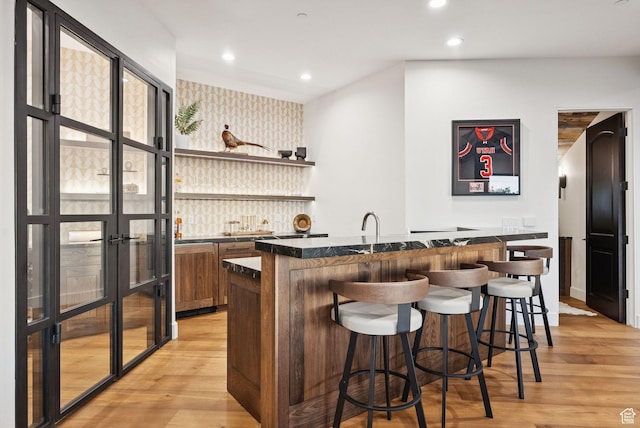 1427 Eagle Way, Park City, UT 84060 - indoor wet bar featuring wallpapered walls, light wood finished floors, recessed lighting, and an accent wall