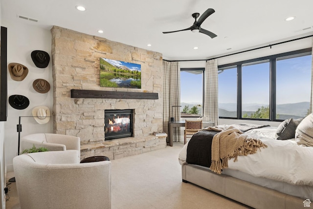 1427 Eagle Way, Park City, UT 84060 - bedroom featuring a stone fireplace, multiple windows, carpet floors, recessed lighting, and ceiling fan
