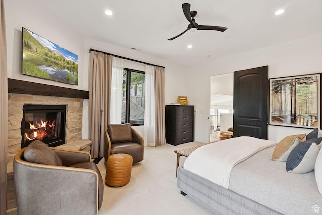 1427 Eagle Way, Park City, UT 84060 - bedroom with recessed lighting, light carpet, a stone fireplace, and a ceiling fan
