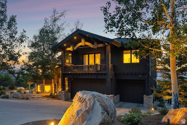 1427 Eagle Way, Park City, UT 84060 - view of front of home with a garage, board and batten siding, and concrete driveway