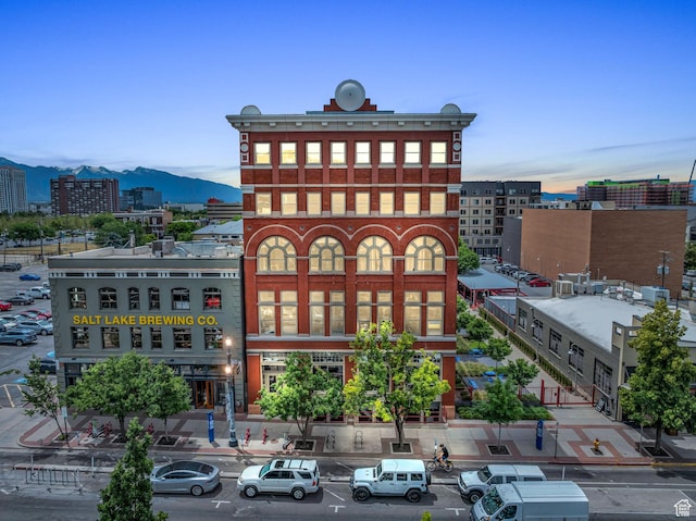 159 W Broadway Unit 301, Salt Lake City, UT 84101 - property at dusk featuring a mountain view and a view of city