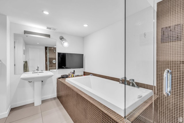 159 W Broadway Unit 301, Salt Lake City, UT 84101 - bathroom with a bath, tile patterned floors, recessed lighting, and a tile shower