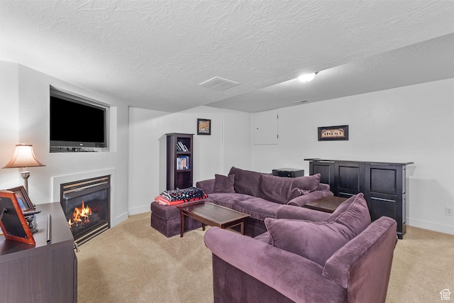 4269 W Lake Brg S, South Jordan, UT 84009 - living area with light colored carpet, a glass covered fireplace, and a textured ceiling