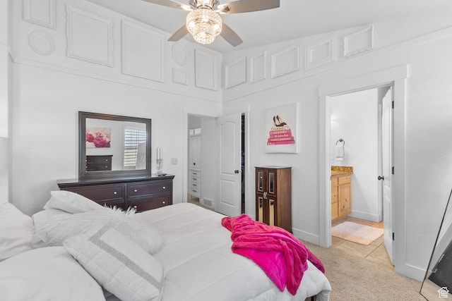 4269 W Lake Brg S, South Jordan, UT 84009 - bedroom with light carpet, ensuite bathroom, and a ceiling fan