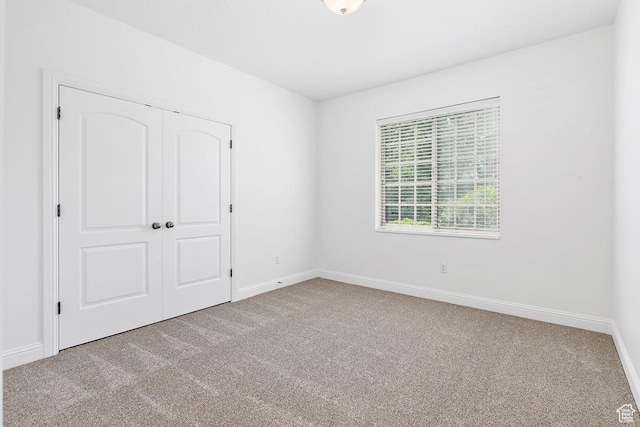 181 N 1200 W Unit 103, Orem, UT 84057 - unfurnished bedroom featuring carpet and a closet