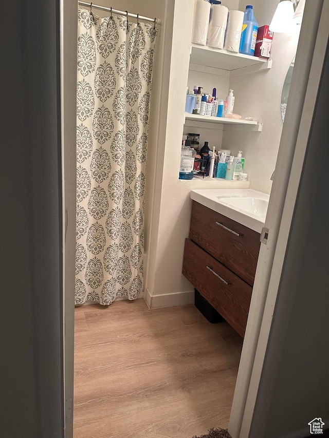 1793 W Trafalga Way N Unit F, Salt Lake City, UT 84116 - bathroom with vanity, wood finished floors, and a shower with shower curtain