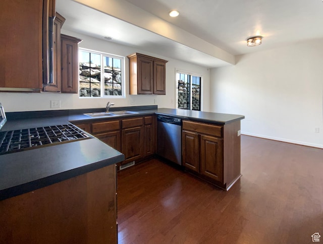 6842 W Grevillea Ln, West Jordan, UT 84081 - kitchen with stainless steel dishwasher, dark countertops, dark wood-style flooring, and recessed lighting