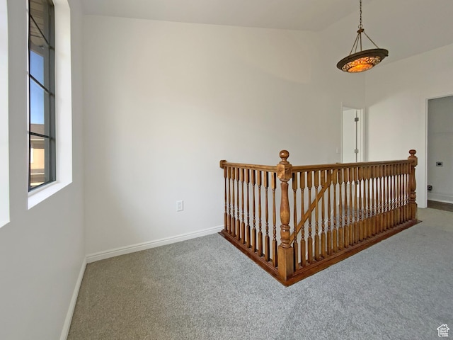 6842 W Grevillea Ln, West Jordan, UT 84081 - hallway with carpet and an upstairs landing