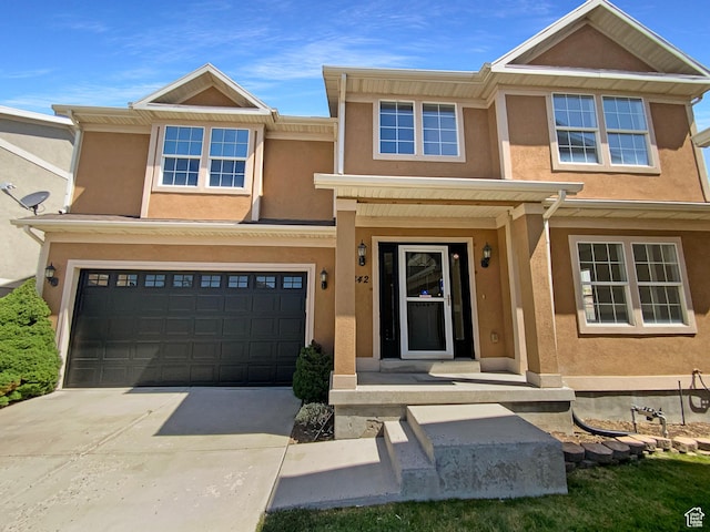 6842 W Grevillea Ln, West Jordan, UT 84081 - view of property featuring stucco siding, concrete driveway, and an attached garage
