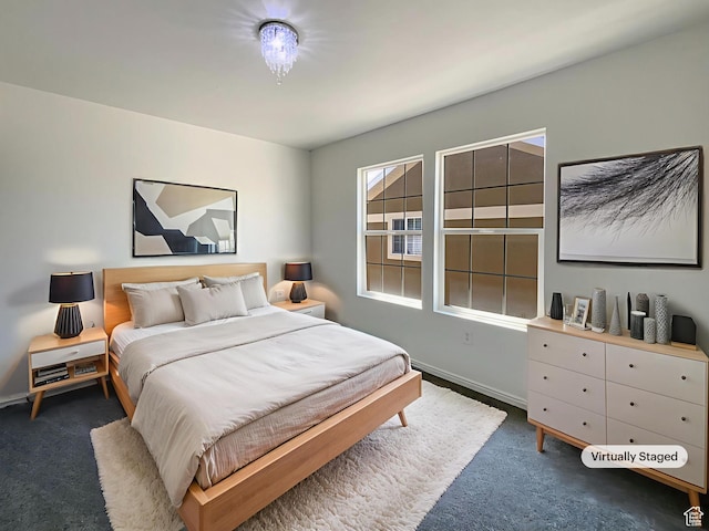 6842 W Grevillea Ln, West Jordan, UT 84081 - bedroom featuring carpet and baseboards