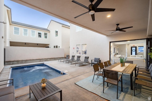 4254 W Cambridge Pkwy, Hurricane, UT 84737 - outdoor pool with a ceiling fan, an outdoor living space, outdoor dining area, and a patio