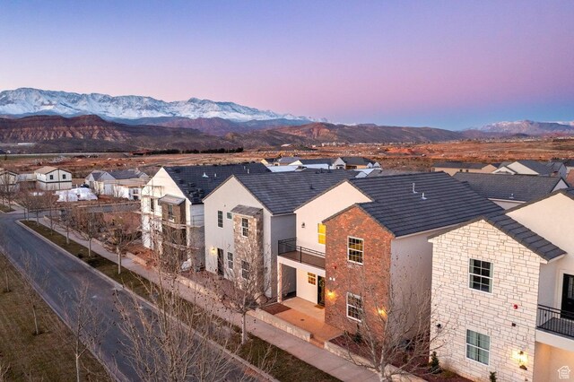 4254 W Cambridge Pkwy, Hurricane, UT 84737 - aerial view at dusk of a residential view and a mountain view
