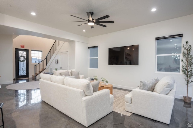 4254 W Cambridge Pkwy, Hurricane, UT 84737 - living room with a ceiling fan, recessed lighting, and stairs