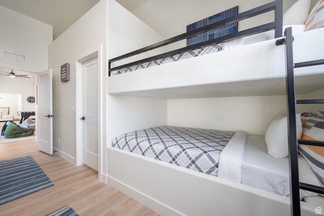 4254 W Cambridge Pkwy, Hurricane, UT 84737 - bedroom featuring wood finished floors and baseboards